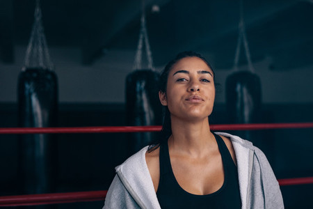 Female boxer inside a boxing ring