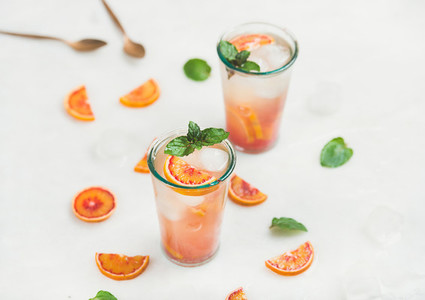 Blood orange fresh summer lemonade with ice and mint