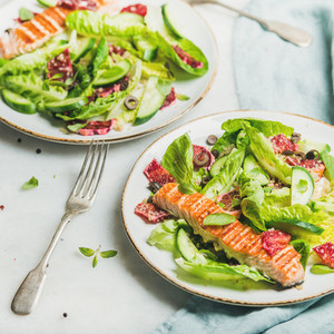 Healthy spring salad with grilled salmon  orange and quinoa