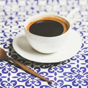 Cup of black Turkish or Eastern style coffee  selective focus