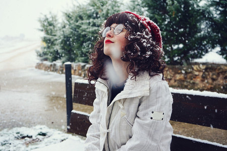 Young woman enjoying a snowy day