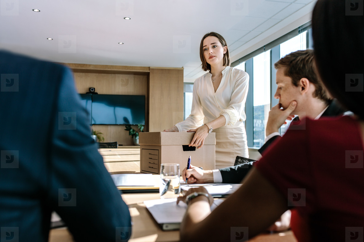 Business professionals brainstorming in office board room
