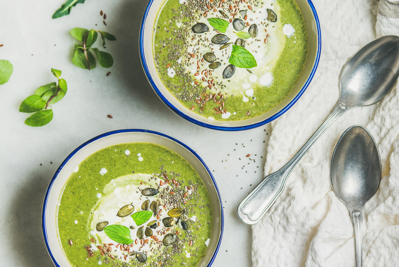 Spring vegan broccoli cream soup with mint and coconut cream