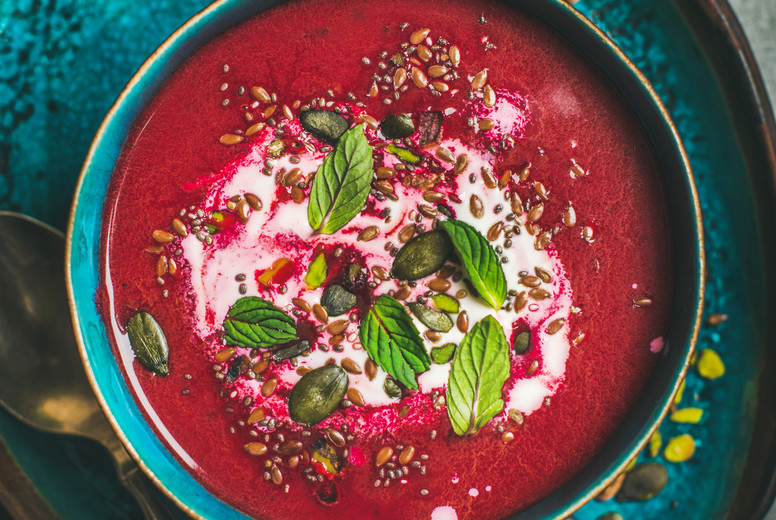 Beetroot vegetarian soup with mint, chia, flax and pumpkin seeds