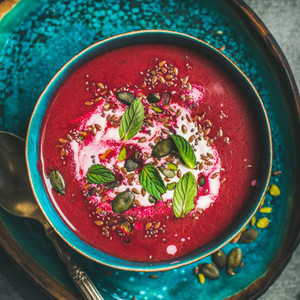 Beetroot vegetarian soup with mint chia flax and pumpkin seeds