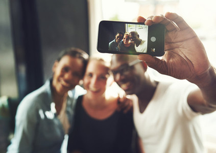 Multi ethnic friends taking a selfie