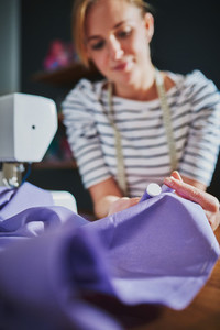 Creative woman sewing