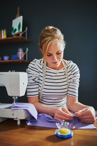 Female designer creating clothes