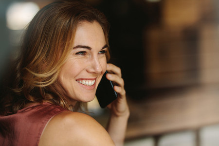Woman talking over mobile phone