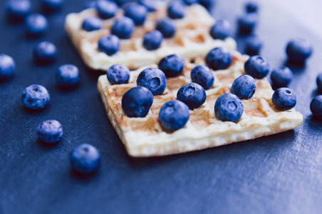 Closeup of waffles and blueberries for breakfast