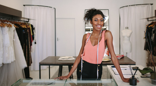 Woman entrepreneur at work in her fashion boutique