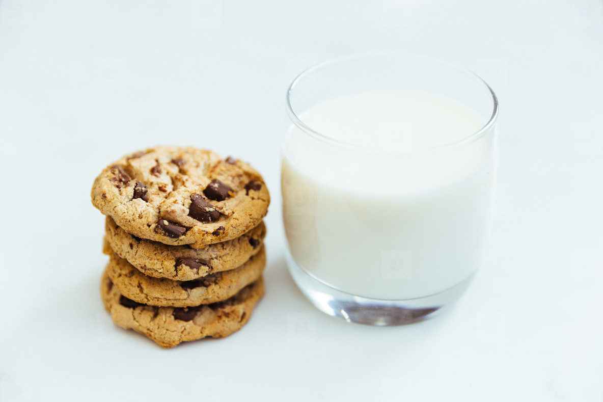 Photos - Chocolate chip cookies and glass of milk ...
