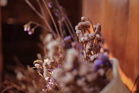 Soft focus of dried flowers in newspaper wrap for decoration