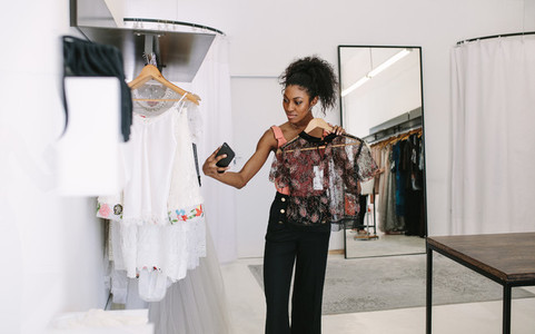 Woman entrepreneur at her fashion boutique