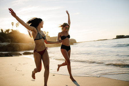 Women enjoying on beach vacation