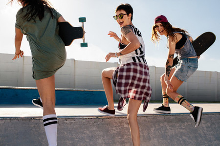 Group of girls having a great time at skate park