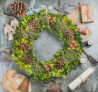 Christmas wreath  pine cones  wooden toys and decoration materials