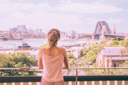 Woman looking at Sydney Harbour