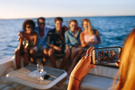 Capturing memories of boat party