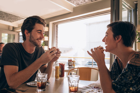 Happy couple enjoying in a restaurant