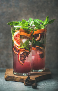 Blood orange citrus lemonade with mint and ice in glasses