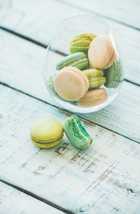 Colorful pastel French macaron biscuits in glass
