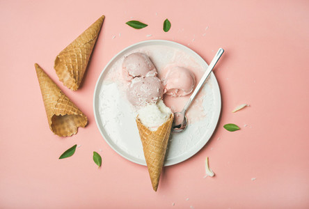 Flatlay of pastel pink strawberry and coconut ice cream scoops