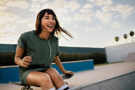 Cheerful woman at skate park