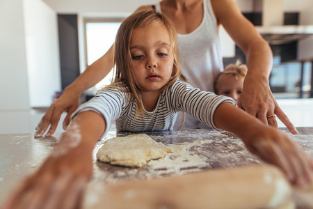 Little girl learning cooking and baking
