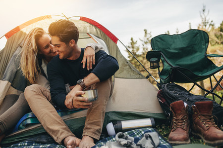 Couple on a romantic camping vacation