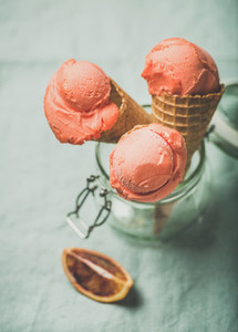 Refreshing summer blood orange ice cream over towel background