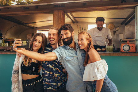 Millennial friends group taking selfie