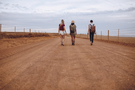 Women walking down the country road