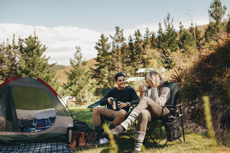 Couple camping in forest