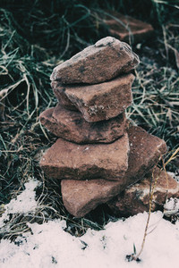 Stones placed one on top of the other frozen by the cold