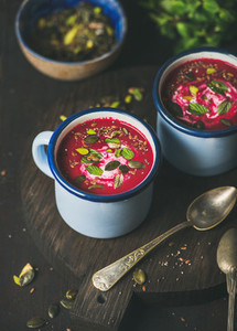 Detox vegan beetroot soup with mint  pistachio and seeds