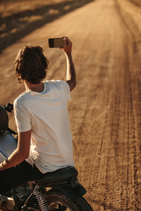Rider capturing memories of his countryside ride