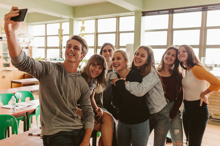 Students taking selfie in classroom