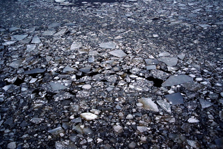 Blocks of ice in dark water