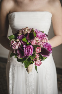 Bride holding her colorful bridal bouquet