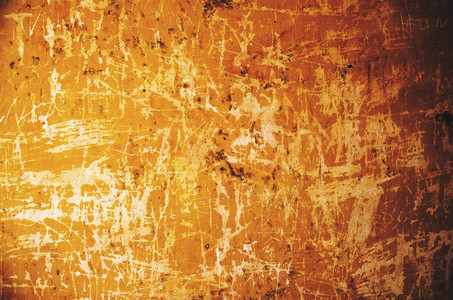 Old scratched yellow wall