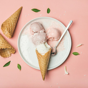 Flatlay of strawberry and coconut ice cream scoops square crop