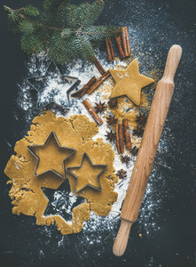 Baking ingredients for Christmas holiday traditional gingerbread cookies preparation black background