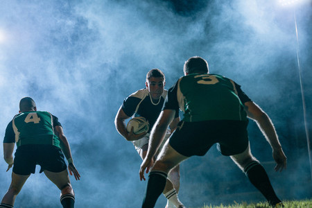 Rugby action under lights