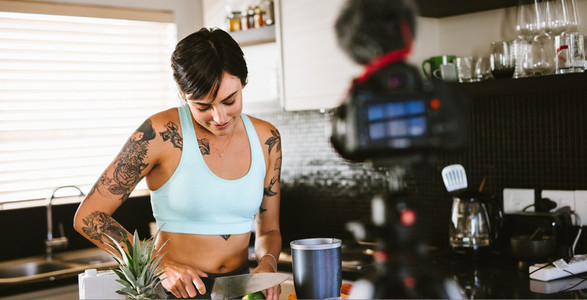 Woman creating a vlog about healthy eating