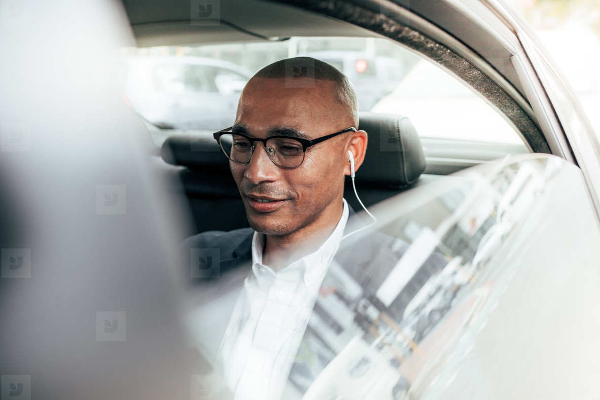 Businessman commuting to office in car