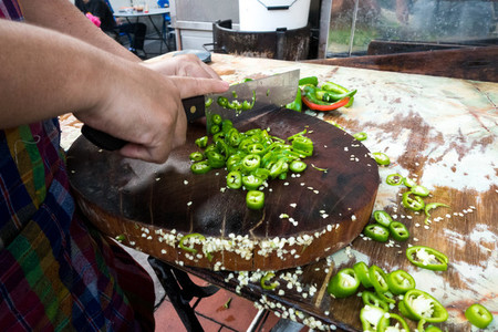 Chopping green hot pepper
