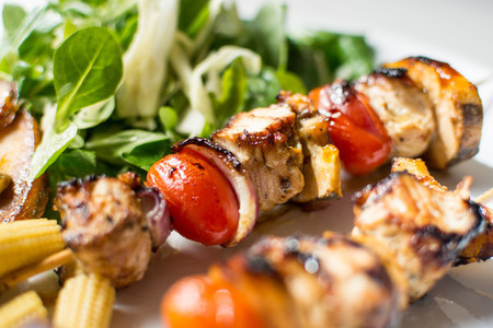 Colorful grilled chicken skewers