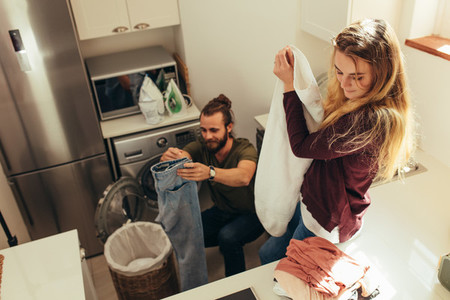 Couple setting their clothes right together