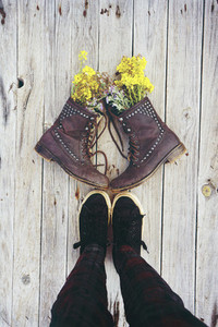 Old boots filled with flowers